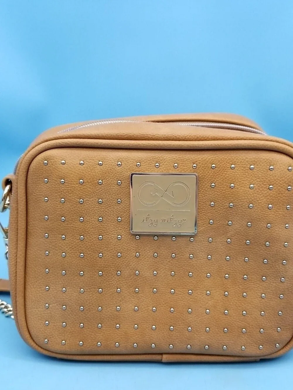 Itzy Ritzy Chelsea + Cole Double Take Studded Crossbody Diaper Purse Caramel